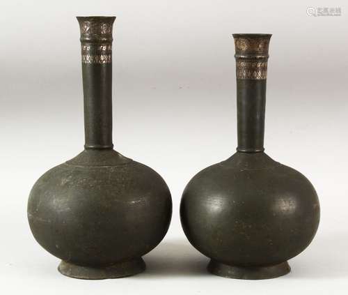 A PAIR OF INDIAN BIDRI BOTTLES, the upper neck with silver i...