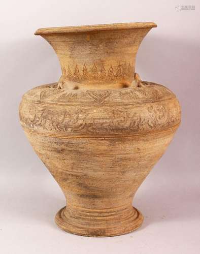 A LARGE EARLY ISLAMIC POTTERY VASE, the body with relief ban...