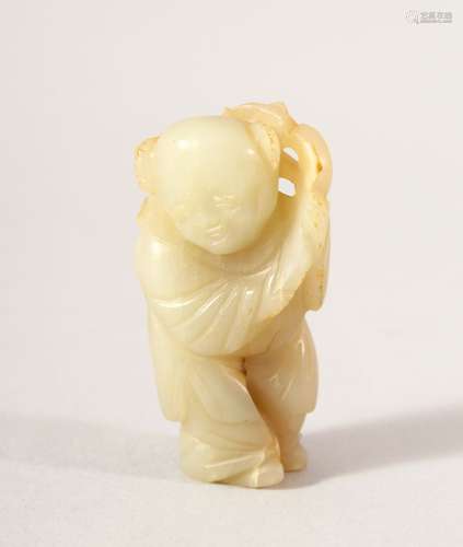 A SMALL CHINESE CARVED JADE FIGURE OF A BOY, possibly Ming D...