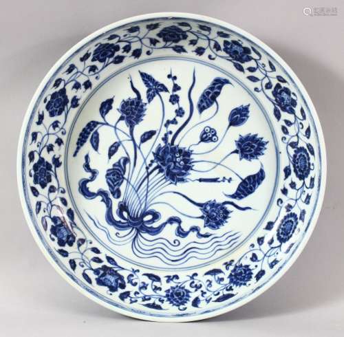 A LARGE CHINESE BLUE AND WHITE DISH, painted with flowers, w...