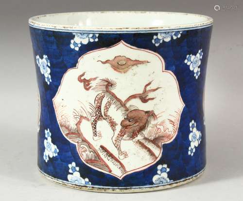 A LARGE CHINESE BLUE AND IRON RED BRUSH POT, decorated with ...