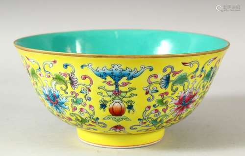 A CHINESE FAMILLE JAUNE PORCELAIN BOWL, the interior with tu...