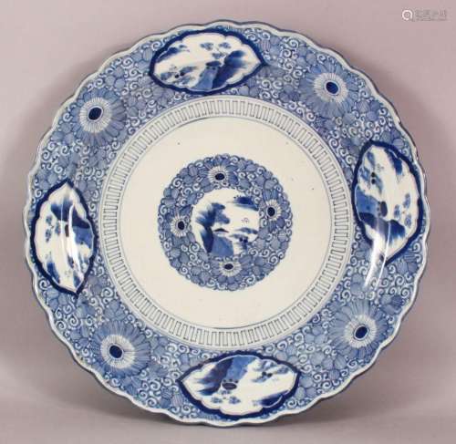 A LARGE JAPANESE MEIJI PERIOD BLUE & WHITE PORCELAIN CHARGER...