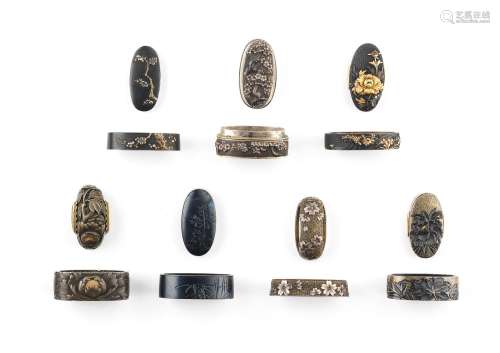 Nine fuchi-gashira (hilt collars and pommels)