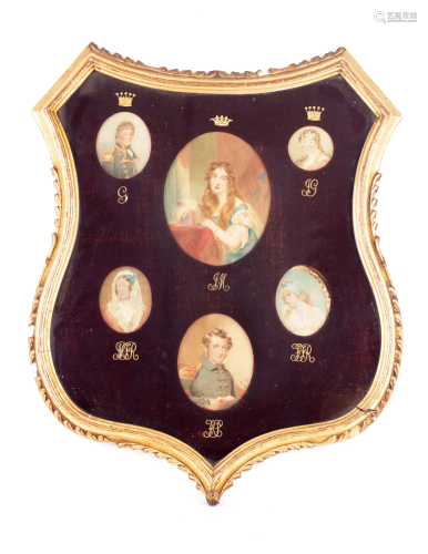 A 19TH CENTURY SHIELD SHAPED GILT EASEL FRAME with