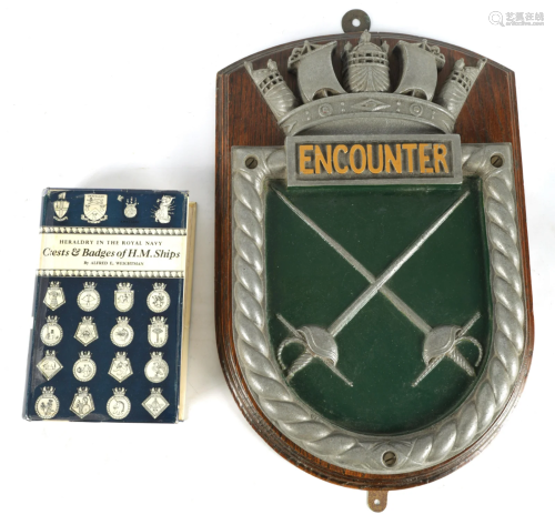 A 20TH CENTURY CAST IRON SHIPS BADGE â€œENCOUNTERâ€