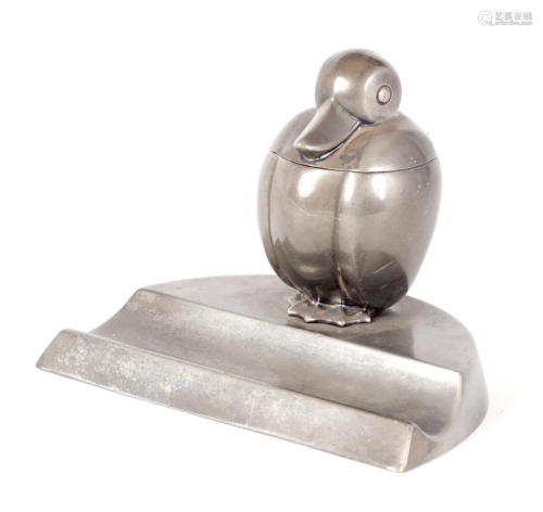 AN UNUSUAL WMF NOVELTY PEWTER INKSTAND modelled as a