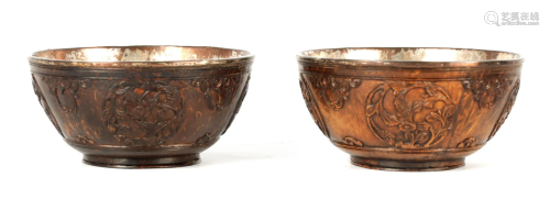 A PAIR OF 19TH CENTURY CARVED COCONUT AND SILVERED
