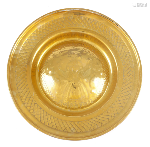 AN EARLY CONTINENTAL LARGE BRASS ALMS DISH with domed