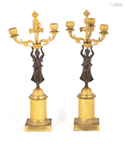 A PAIR OF REGENCY FIGURAL BRONZE AND ORMOLU CANDELABRA