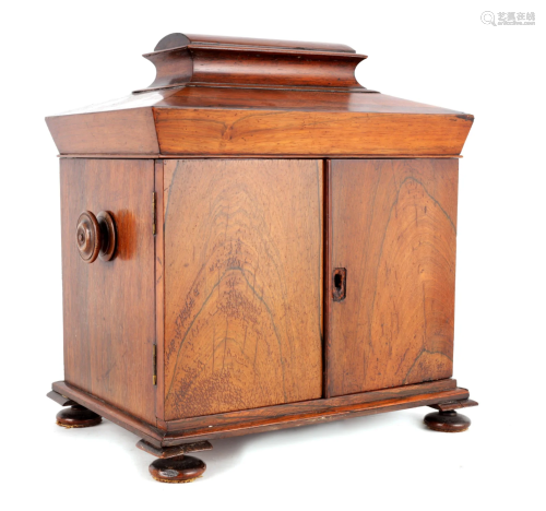 A 19TH CENTURY ROSEWOOD SARCOPHAGUS SHAPED WORKBOX