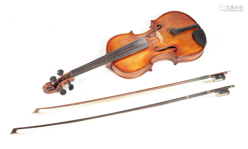 AN ANTIQUE VIOLIN in a fitted hard case with two bows