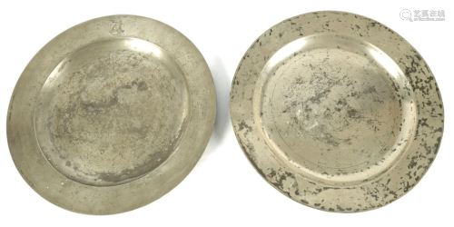 TWO 18TH CENTURY PEWTER CHARGERS one with a coat of