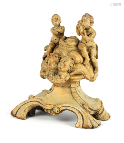 AN EARLY 18TH CENTURY ITALIAN CARVED LIMEWOOD
