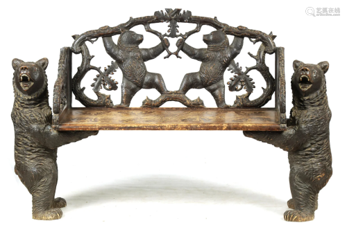 A 19TH CENTURY BLACK FOREST CARVED TWO SEATER HALL