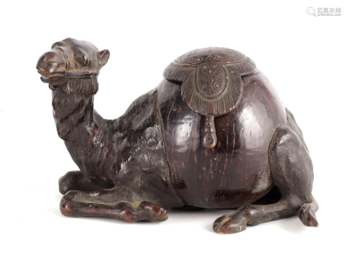 AN UNUSUAL 19TH CENTURY BRONZE AND COCONUT INKWELL