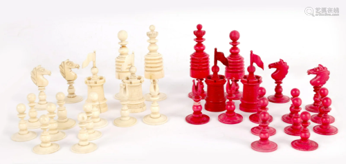 A 19TH CENTURY STAINED BONE CHESS SET a complete set of