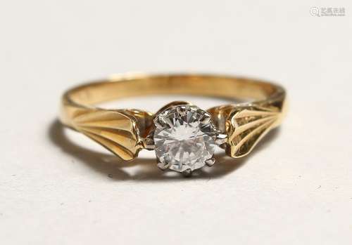 AN 18CT GOLD DIAMOND SOLITAIRE RING