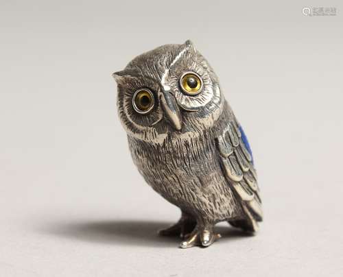 A NOVELTY SILVER OWL PIN CUSHION.