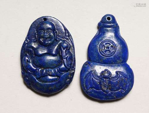 TWO CARVED LAPIS PENDANTS