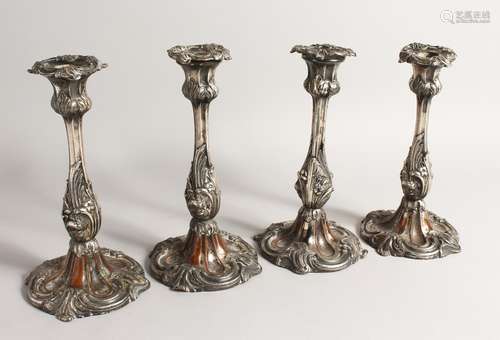 A SET OF FOUR 19TH CENTURY ROCOCO STYLE CANDLESTICKS 9INS LO...