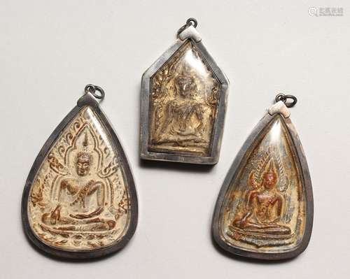 THREE ASIAN ICON PENDANTS.