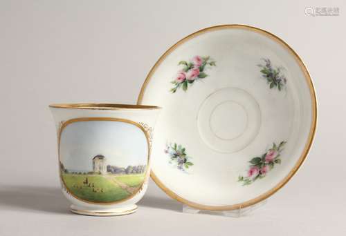 A 19TH CENTURY COPENHAGEN B. & G. CUP AND SAUCER with a land...