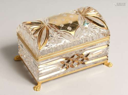 A CUT GLASS AND GILDED DOMED TOP JEWEL CASKET on claw feet. ...