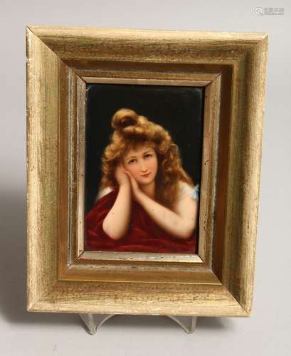 A GERMAN PORCELAIN MINIATURE OF A YOUNG LADY 5ins x 3.5ins i...