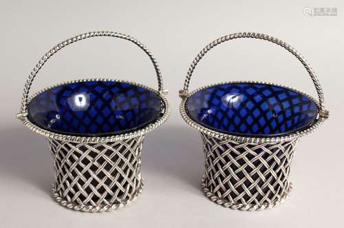 A VERY GOOD PAIR OF VICTORIAN PIERCED CIRCULAR BASKETS with ...