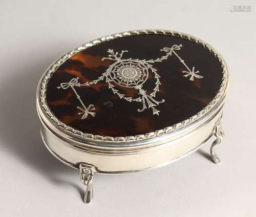 A GOOD OVAL SILVER AND TORTOISESHELL JEWLLLERY BOX on four c...