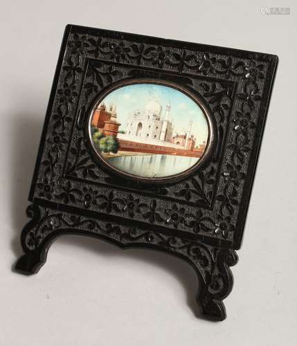 AN INDIAN OVAL MINIATURE, Taj Mahal, in a colourful frame