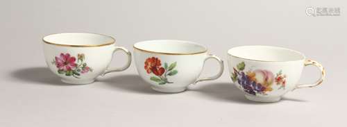 THREE 19TH CENTURY BERLIN CUPS painted with flowers. Septre ...