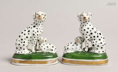 A SMALL PAIR OF PORCELAIN GROUPS OF DALMATIONS 3ins high