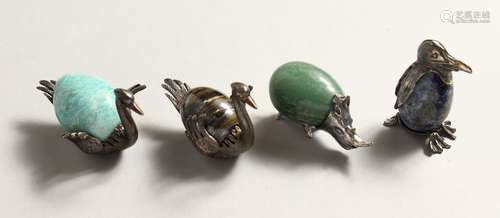 FOUR SILVER MOUNTED `PENGUIN, RHINO, AND TWO SWANS'