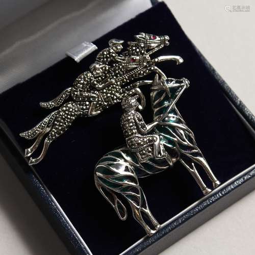 A PAIR OF SILVER MARCASITE HORSE AND JOCKEY BROOCHES