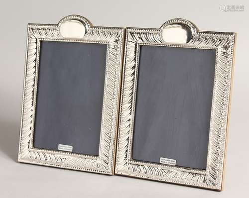 A PAIR OF SILVER WRYTHEN UPRIGHT PHOTOGRAPH FRAMES 8.5ins x ...