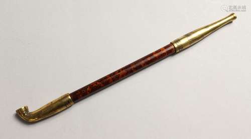 AN OPIUM PIPE