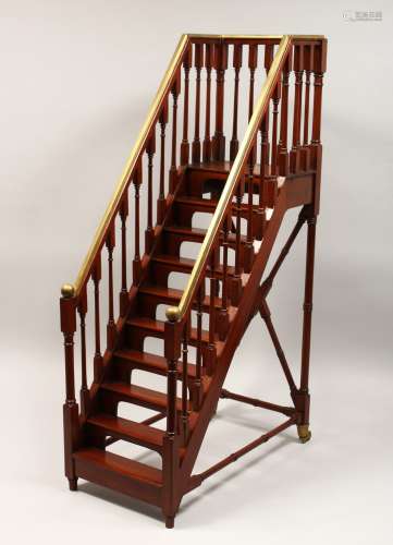 A GOOD MAHOGANY AND BRASS MODEL OF A STAIRCASE, with nine tr...
