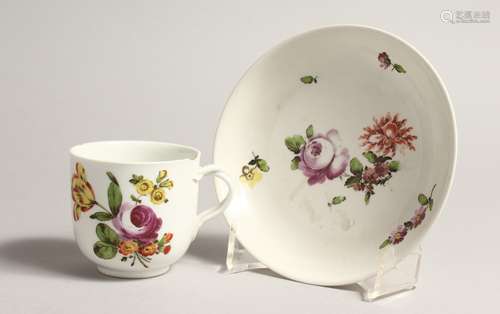 A 19TH CENTURY VIENNA COFFEE CUP AND SAUCER painted with flo...