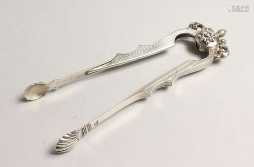 A PAIR OF SILVER TONGS