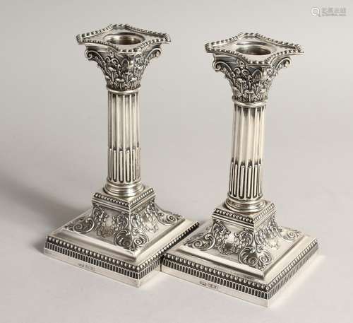 A PAIR OF CLASSICAL SILVER CANDLESTICKS Sheffield 1902 Maker...