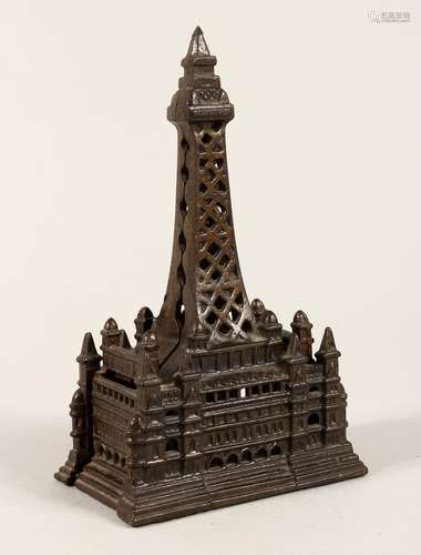 A VICTORIAN CAST IRON BLACKPOOL TOWER NOVELTY BOX 7ins high.