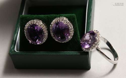 A PAIR OF SILVER AMETHYST AND ZIRCON EAR RINGS AND RING.