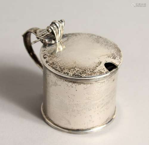 A DRUM SHAPED SILVER MUSTARD POT, with blue glass liner Lond...