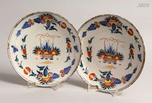 A PAIR OF 18TH CENTURY DUTCH DELFT TIN GLAZED PLATES with co...