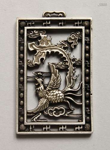 A CHINESE SILVER PIERCED PENDANT