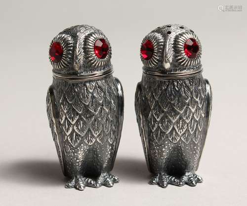 A PAIR OF .800 SILVER PLATED OWL SALT AND PAPPERS