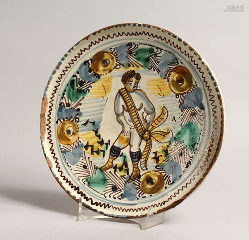 AN ITALIAN MAJOLICA PEDESTAL LOW TAZZA with cupid design. 8....