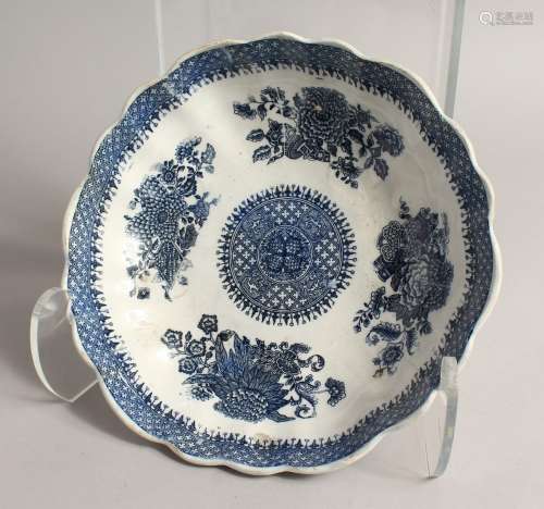 A BLUE AND WHITE SHAPED CIRCULAR DISH 9.5ins diameter Blue s...